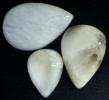 Unusual white mesolite cabochon from Maharashtra, India